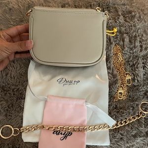 Brand new leather Mini Pochette